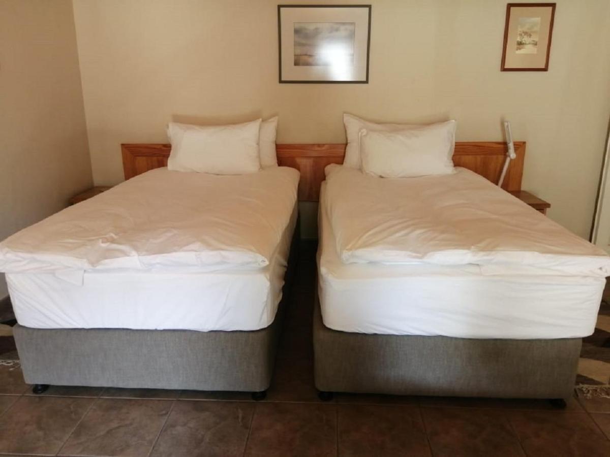 Hotel Pension Palmquell Klein Windhoek Extérieur photo
